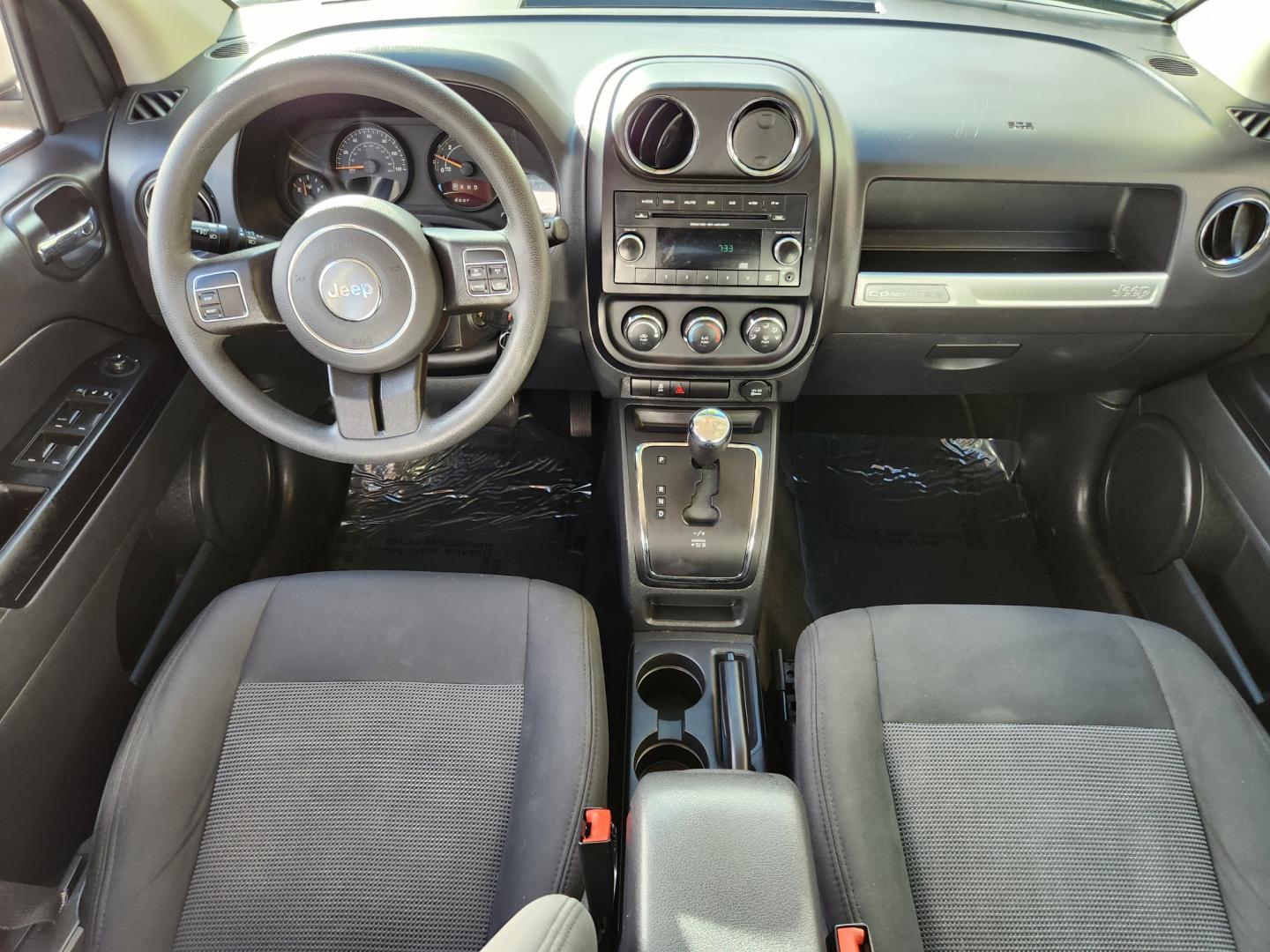 2015 Billet Silver Metallic Clearcoat /Dark Slate Gray Jeep Compass Sport (1C4NJDBB9FD) with an 2.4L I4 DOHC 16V Dual VVT engine, Automatic transmission, located at 10890 W. Colfax Ave., Lakewood, CO, 80215, (303) 274-7692, 39.739914, -105.120132 - 2015 Jeep Compass<br><br>D1 Auto NEVER charges dealer fees! All cars have clean titles and have been inspected for mechanical issues. We have financing for everyone. Good credit, bad credit, first time buyers.<br><br>Please call Lakewood Location 303-274-7692 or Thornton 303-287-5511 to schedule a t - Photo#9